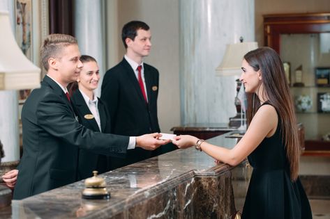 Picture of guests getting key card in hotel, Premium Photo | Premium Photo #Freepik #photo #people #card #woman #man Front Office Hotel, Room Division, Hotel Chef, Hotel Worker, Hotel Photography, Office Photo, Hotel Reception, Hotel Staff, Front Office