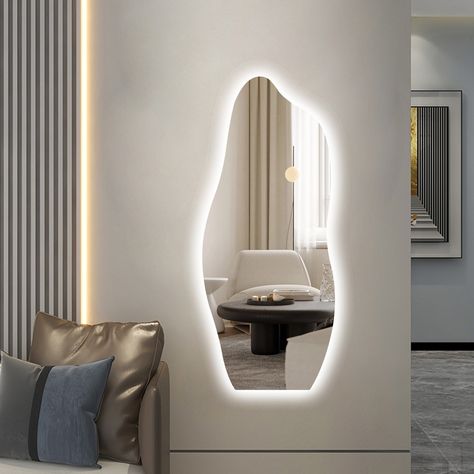 Ivy Bronx Wall Mirror | Wayfair Retro Wall Mirror, Assymetrical Mirror, Asymmetrical Wall, Irregular Mirror, Leather Wall, Oval Wall Mirror, Wood Wall Mirror, Hall Decor, Contemporary Chic