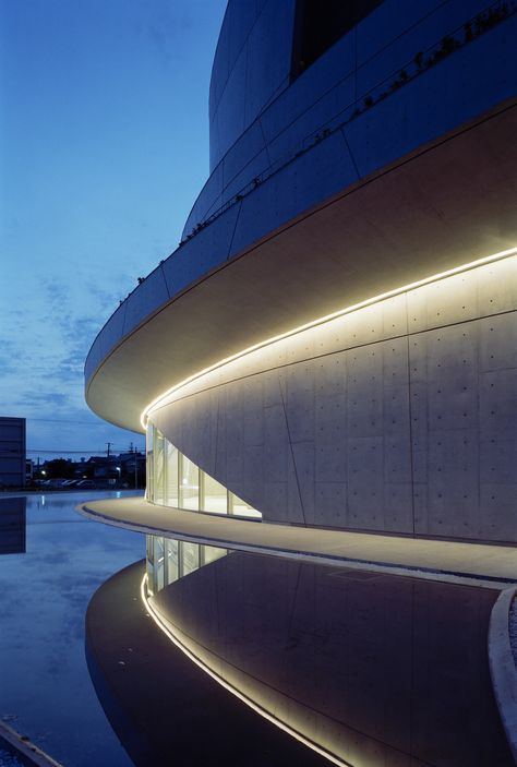 Akiha Ward Cultural Center / Chiaki Arai Urban and Architecture Design. Photograph by Taisuke Ogawa Lighting Architecture, Niigata Japan, Guiyang, Architectural Lighting Design, Vintage Industrial Lighting, Facade Lighting, Architectural Lighting, Centre Commercial, Indirect Lighting