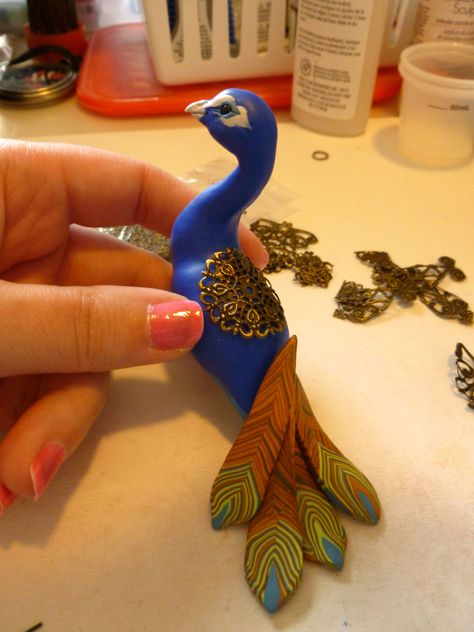 Progress of a Polymer clay peacock sculpture, handmade MysticReflections Polymer Clay Peacock, Peacock Clay Art, Clay Sculptures Ideas, Polymer Clay Art Sculpture, Clay Peacock, Peacock Sculpture, Christi Friesen, Polymer Clay Embroidery, Clay Fairy House