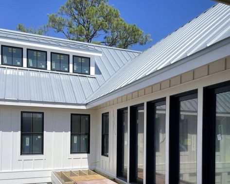 Philip and Jenni, the DIY enthusiasts behind Philip or Flop, recently chose a metal roof for their beach house project on Fripp Island. After successfully installing a McElroy Metal standing seam roof on their main home's screened-in porch addition, they decided to use a similar system for their coastal property. 

View the full article on McElroyMetal.com 

#metalroofing #metalroof #residentialroofing #newroof #roofing #residentialroofing #dreamhome #homeimprovement #roofingexperts Metal Shake Roof, Roofing Styles, Metal Roof Houses, Fripp Island, Metal Shingles, Coastal Exterior, Homeowner Tips, Standing Seam Roof, Metal Roofs