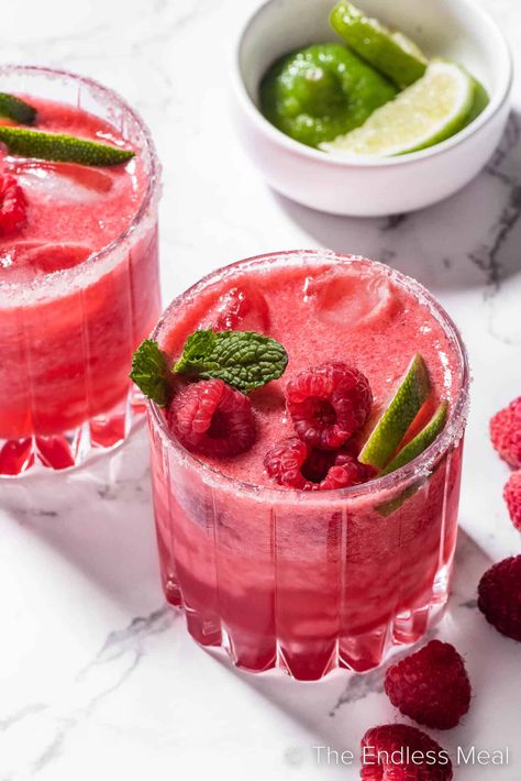 This raspberry margarita is a fruity take on the classic that's perfect for berry season, and special occasions of all kinds. It's fresh raspberries blended up with tequila, lime juice, and agave syrup then served in a glass with a sweet and salty rim. It's easy to make and it's ready in just 5 minutes! #theendlessmeal #margarita #raspberrymargarita #tequila #cocktail #drink #raspberry #summer Raspberry Margarita Recipe, Cocktail Infusion Kit, Raspberry Margarita, Mamacita Needs A Margarita, Alcohol Infusion, Classic Margarita Recipe, Margarita Party, Raspberry Cocktail, Self Care Package