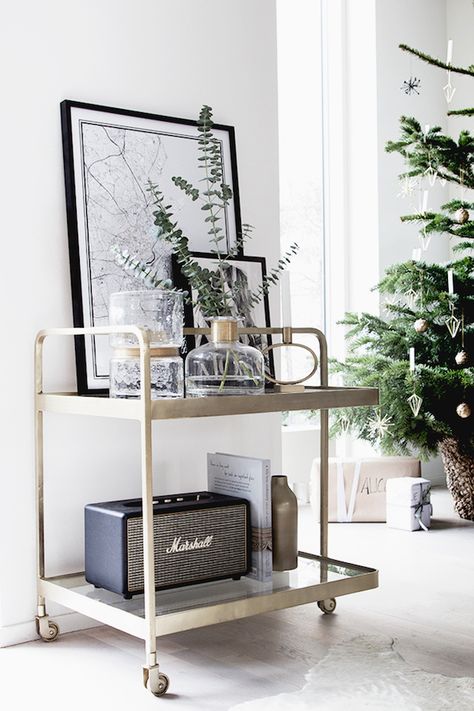 Getting into the 'spirit' of Christmas with a brass drinks trolley (from Nordal).  / Photograhy Niki / Brantmark - My Scandinavian Home  Blog (styling - Genevieve Jorn). Sweet Home Design, Bar In Casa, Smart Tiles, Interior Design Per La Casa, Bar Cart Styling, Deco Stickers, Bar Cart Decor, Living Room Scandinavian, Decoration Inspiration