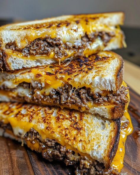 GROUND BEEF GRILLED CHEESE SANDWICH 🍔🧀 Ingredients: 1/2 lb ground beef 4 slices of bread (your choice, such as sourdough or whole wheat) 4 slices of cheddar cheese (or cheese of your choice) 1/2 cup shredded mozzarella cheese (optional, for extra meltiness) 1 small onion, finely chopped 2 cloves garlic, minced 2 tbsp butter Salt and black pepper, to taste 1 tbsp Worcestershire sauce (optional, for added flavor) 1 tbsp olive oil (for cooking the ground beef) Directions: Ste... Beef Grilled Cheese, Ground Beef Grill, Olive Oil For Cooking, California Food, Sandwich Ingredients, Beef Casserole Recipes, Beef Sandwich, Yummy Comfort Food, Cheese Sandwich