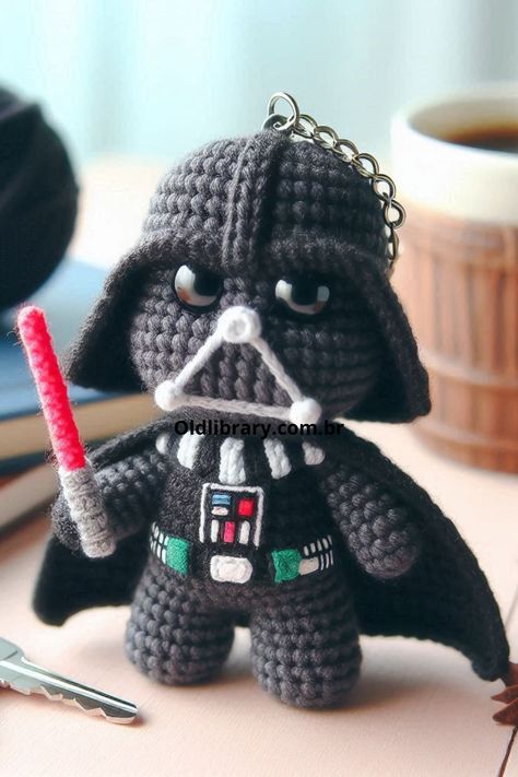 Create your own amigurumi dark side character with this detailed crochet pattern, featuring a helmet, cape, and lightsaber Crochet Darth Vader Amigurumi, Darth Vader Crochet Pattern Free, Crochet Lightsaber, Star Wars Crochet Patterns Free, Crochet Darth Vader, Amigurumi Starwars, Star Wars Amigurumi, Dark Vader, Star Wars Crochet