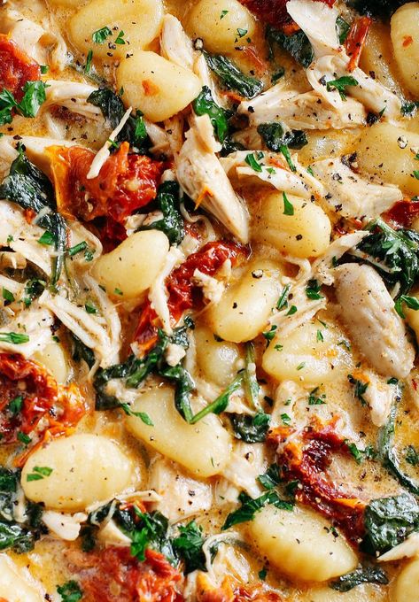 This EASY One Skillet Sun Dried Tomato Chicken and Gnocchi is the perfect weeknight dish that is tossed together with spinach, garlic and shredded asiago cheese and made in under 30 minutes! Sun Dried Tomato Chicken, Chicken And Gnocchi, Tomato Chicken, Chicken Gnocchi, Asiago Cheese, One Skillet, Gnocchi Recipes, Asiago, Mediterranean Diet Recipes