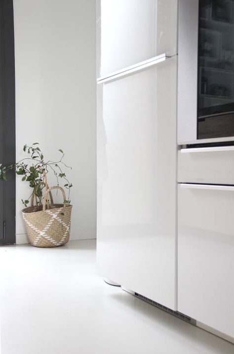 Kitchen of the Week: A Designer’s Own Ikea Hack Kitchen in Provence, Before and After White Glossy Kitchen, Hidden Refrigerator, White Concrete Floors, Glossy Kitchen, White Fridges, Ikea White, Ikea Hack Kitchen, Classy Kitchen, Galley Kitchen Remodel