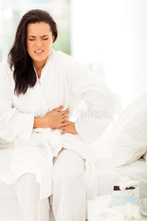 Woman stomach pain. Young woman having stomach pain at home #Sponsored , #paid, #PAID, #stomach, #home, #woman, #Woman Silent Reflux, Stomachache, Warm Lemon Water, Stomach Ache, Stomach Acid, Stomach Pain, Acid Reflux, Health Risks, Health Info