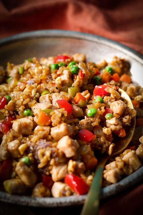 Use fresh or leftover white rice and either chicken or pork for this easy, vegetable-packed Blackstone fried rice. Cooking fried rice on a Blackstone Griddle is fast and easy, and creates the perfect texture and flavor.   Fried rice is exactly the kind of thing a Blackstone griddle was made for. I mean, sure, you can easily make fried rice in a skillet or wok on the stovetop but it's challenging to get the skillet hot enough and then maintain that heat during the cooking process. And… White Rice And Chicken, Blackstone Fried Rice, Fried Rice With Pork, Leftover White Rice, Rice With Pork, Cooking Fried Rice, Make Fried Rice, Beef Fried Rice, Rice And Chicken