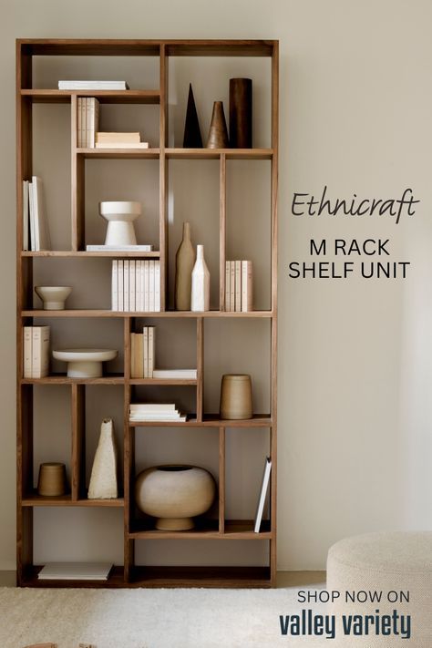 Inspired simplicity is the essential hallmark of the M Rack shelving unit from Ethnicraft. The M Rack offers a wide range of storage and display solutions for everything from books, planters and tech, to your favorite pieces of ceramics and sculptural objét. Available in two sizes and three wood finishes—the M Rack will fit perfectly in any room with any décor. Tall: 86”T x 41”W x 12”D Short: 35.5"T x 54.4”W x 12”D Solid Wood Finishes: Oak, Black Stained Oak or Natural Teak Bedroom Shelf Wood, Living Room Display Unit, Book Unit Design, Living Room With Books, Book Shelves Design, Book Shelves In Living Room, Display Unit Design, Book Shelves Ideas, Shelving Unit Ideas