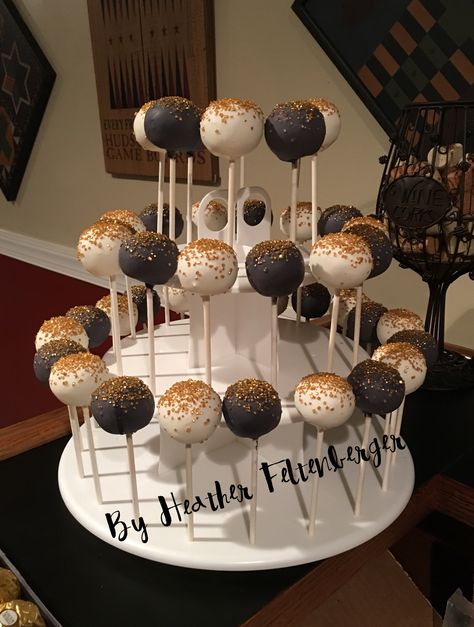 New Years Eve white black and gold cake pops New Years Cake Pops Ideas, 50th Birthday Cake Pops For Men, Black White Gold Cake Pops, New Years Eve Cake Pops, Cake Pops Gold And Black, Sweet 16 Party Ideas Themes Black White Gold, New Year’s Eve Cake Pops, Black Gold Cake Pops, Black And Gold Cakepops