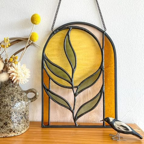 Stained Glass Art on Instagram: "I love this little still life of this sweet piece inspired by the shapes and colours of the Aussie bush! My @sabceramics vase and @donna.saunders.ceramics magpie are bringing the right vibes 💕 . . . . #australianartist #magpie #eucalyptus #stainedglass #stainedglassart #glassart" Stained Glass Simple Ideas, Stained Glass Table Numbers, Stained Glass Design Ideas, Simple Stained Glass Designs, Stained Glass Art Diy, Art Deco Stained Glass Patterns, Easy Stained Glass Projects, Stained Glass Art Patterns, Stained Glass Designs Templates