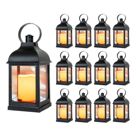 PRICES MAY VARY. 12 PIECE SET 10" DECORATIVE LANTERNS with Flameless LED Lighted Candle, 5HR Timer, Weather Resistant - Decorative Outdoor Lanterns - Black. Perfect for your home, garden, patio or weddings! VINTAGE DESIGN WITH RUSTIC CHARM - These classic lanterns are made with durable weatherproof plastic so you can use them outdoors and not have to worry about them rusting. The side panels are made of glass that helps create realistic lighting effect. Each Lantern features a Convenient Carry R Outdoor Wedding Lighting, Decorative Lanterns, Outdoor Lantern Lighting, Small Lanterns, Lantern Candle Decor, Garden Weddings, Led Lantern, Garden Candles, Outdoor Home