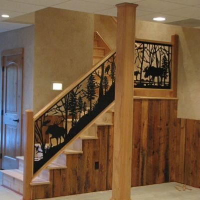 Stair and landing railing featuring moose Itching Design, Custom Fireplace Screens, Cabin Stairs, Staircase Renovation, Steel Stair Railing, Deck Stair Railing, Lodge Style Home, Rustic Staircase, Tahoe Cabin