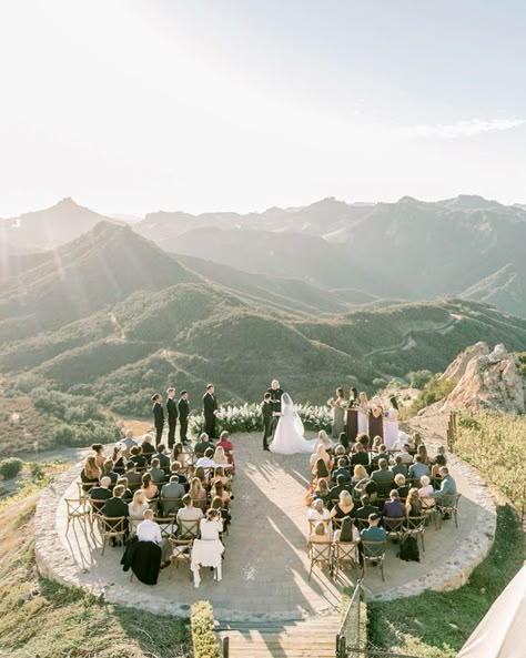 From timelines to travel tips, read on as we share some wedding invitation wording examples for your destination wedding - and a few etiquette rules to keep in mind along the way. The post Destination Wedding Invitation Wording Examples and Etiquette￼ appeared first on WedSites Blog. On Top Of A Mountain, Wedding Ceremony Ideas, Top Of A Mountain, Malibu Wedding, Unique Wedding Venues, Christian Wedding, Martha Stewart Weddings, Floral Arch, Outdoor Wedding Ceremony