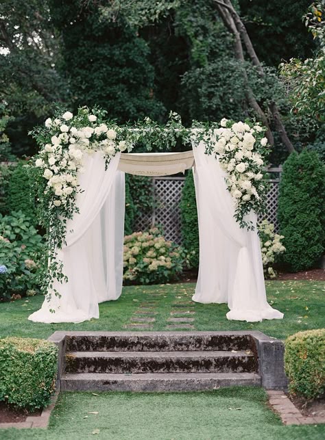 Chiffon chuppah with loose organic flowers for a wedding arch. Jaqueline Benet Photography, wedding a Admiral's House in Seattle WA. Planning, Design and Flowers by Simply by Tamara Nicole, Seattle Wedding Planners Chuppah Decorations Simple, Wedding Chuppah Flowers Romantic, Pergola Ceremony Decorations, Wedding Ceremony Hoopa, White Pergola Wedding Decorations, Chuppah Drapery, Wedding Chuppah Outdoor, Chuppah Wedding Flowers, Simple Wedding Chuppah