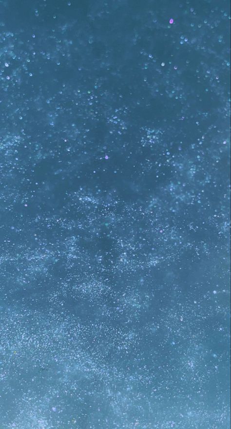 Blue glitter wallpaper. Picture of glitter in water. The color is blue. Light blue. Light Blue Sparkle Background, Blue Shimmer Aesthetic, Glitter Blue Aesthetic, Light Blue Asthetics Wallpers, Light Blue Asthetics Photos Wallpaper, Glitter Water Aesthetic, Light Blue Glitter Aesthetic, Light Blue Asthetic Wallpers, Blue Sparkles Aesthetic