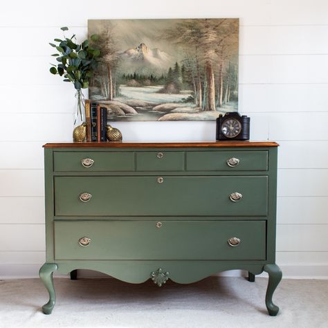 Fusion Mineral Paint BAYBERRY. Adeep muted olive green, Bayberry is perfectly vintage. It’s stunning on its own or as part of a natural palette. #prairierevival #paintedcabinets #relovedfurniture #fusionmineralpaintretailer #fusionmineralpaint #fusioncotw #diypaintedfurniture #diyhomeprojects #furnituremakeover #diydecor #furniturerenovation #coloroftheweek #paintitbeautiful #stjosephillinois Olive Dresser, Dresser Repaint, Gate Lodge, Maple Dresser, Green Painted Furniture, Provincial Dresser, Green Dresser, Diy Dresser Makeover, Refinished Furniture