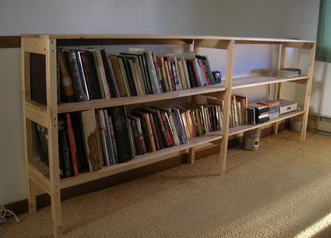 andy built this low slung bookcase from his ikea vestby bed frame. great repurposing of old furniture. “i needed a low, long bookshelf, and was unable to find one to buy, so i decided to do a conversion project with my old bed, and it worked out great! it was quite simple, and made really … Ikea Full Bed Frame, Ikea Storage Bed Hack, Long Low Bookcase, Long Bookcase, Long Bookshelf, Ikea Storage Bed, Modern Kids Beds, All Modern Furniture, Minimalist Bookshelves