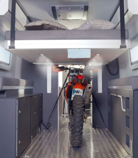 Some gear might prove too tall to sleep over, but with its available height adjustment, the... Motorcycle Van, Motorbike Camping, Van With Motorcycle Rack, Retractable Bed, Motorbike Storage, Elevator Bed, Motocross Camper Van, Sprinter Van Camper, Sprinter Van Dirtbike