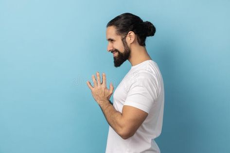 Side view of devious man with beard wearing white T-shirt smirking and conspiring cunning sly plan. royalty free stock photography Man With Beard, Shirt Advertisement, Vector Frame, Stock Photography Free, Side View, Bearded Men, One Sided, White T Shirt, White Tshirt