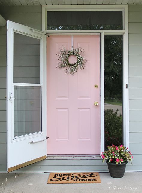 This pretty in pink front door is ga ga gorgeous!! Bella pink front porch, wowzas! Adore the home sweet home rug too! Such a cute porch decor idea! Pink Door Gray House, Pink Front Door Sherwin Williams, Pink Front Door Tan House, Pink Front Porch Decor, Pink Front Door Colors, Light Pink Front Door, Light Pink Door, Paint Doors, Cottage Colors