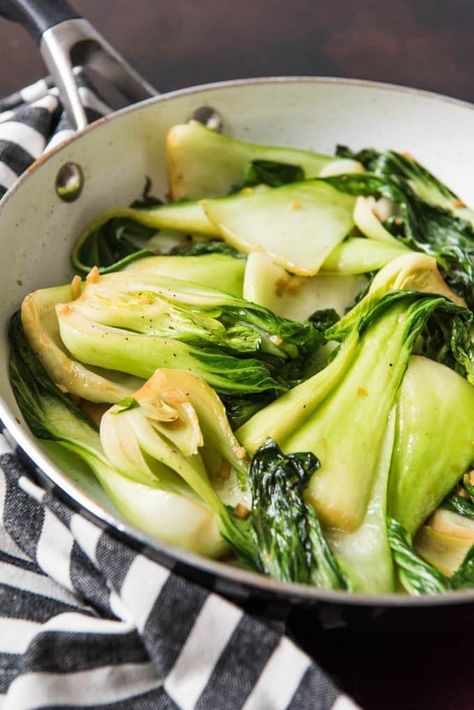 Stir-Fried Baby Bok Choy is a simple vegetable side dish that is ready in under 10 minutes start to finish. It's a little garlicky with a great tender-crisp texture and one of my go-to veggie options when I'm making a more protein-centric main dish and want a great vegetable to serve. #bokchoy #stirfry #easy #vegetables #sidedish #asian #healthy #babybokchoy Chinese Stir Fry Sauce, Asian Greens, Vegetarian Oyster Sauce, Cocktail Party Food, Chinese Cooking Wine, Asian Vegetables, Asian Sauce, Recipetin Eats, Recipe Tin