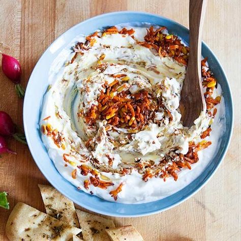 White dips don't have to be humdrum. In this recipe from cookbook, Cara Mangini sautes grated carrot, pine nuts and garlic in olive oil, then stirs the mixture into Greek yogurt. Carrot Yogurt, Recipes For Dips, Recipes Dips, Deceptively Delicious, Fresh Vegetable Recipes, Marinated Cheese, Cleaner Eating, Tomato Bread, Make Ahead Appetizers