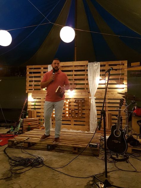 Worship outdoors Diy Outdoor Stage Ideas, Outdoor Worship Night, Backyard Stage For Band, Pallet Stage Platform, Outdoor Karaoke Party Ideas, Diy Outdoor Stage, Diy Stage Platform, Outdoor Stage Ideas, How To Decorate A Garage For A Party