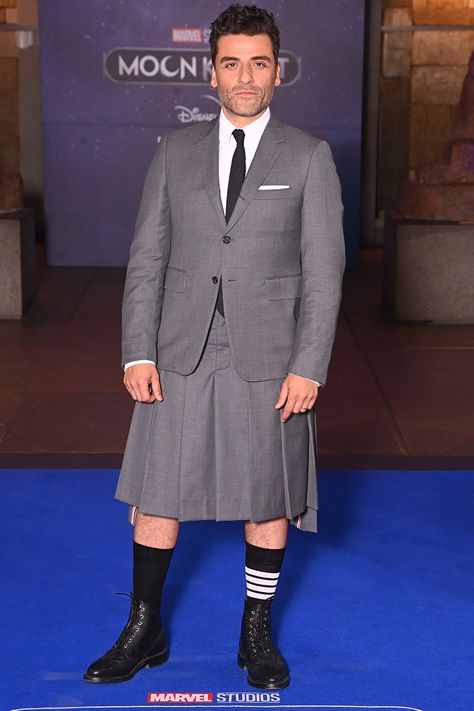 Oscar Isaac Repeats Iconic Kilt Look for Premiere of Marvel's<em> Moon Knight</em> Valentino Suit, Michael Fisher, Guys In Skirts, Marvel Ships, Grey Pleated Skirt, A Man In A Suit, Man In A Suit, Marvel Moon Knight, Univers Marvel