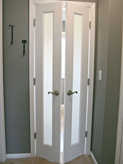 Although doors are pretty much necessary on bathrooms, sometimes it is the door that proves to be a huge obstacle to usable space. As a stylish solution, these split french doors were added to now swing out into the hallway. Frosted glass panels allow light to pass through but maintain privacy. Bi Fold Doors Dining Room, Bathroom Door Alternatives, Door Ideas For Small Spaces, Traditional Small Bathrooms, Doors For Small Spaces, Bathroom Door Ideas, Glass Bathroom Door, Bilik Air, Luxury Vinyl Tile Flooring