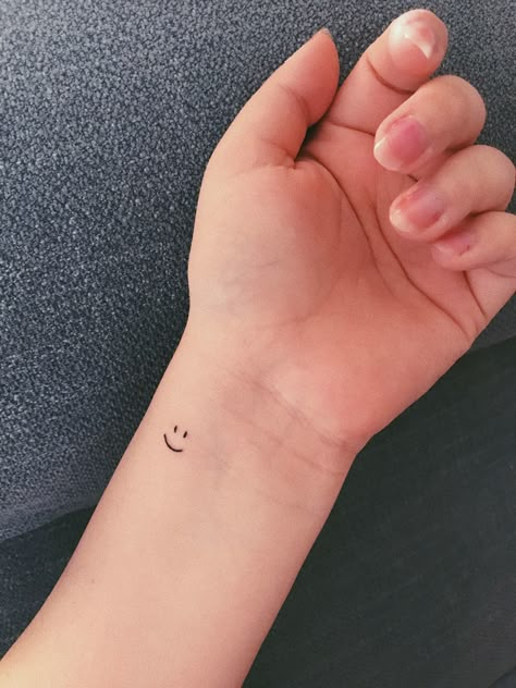 Wrist Smiley Face Tattoo, Tiny Tattoos Smiley Face, Mini Smiley Face Tattoo, Dainty Smiley Face Tattoo, Smiley Face Tattoo Wrist, Simple Smiley Face Tattoo, Small Smile Tattoo, Smiley Tattoo Design, Tiny Smiley Face Tattoo