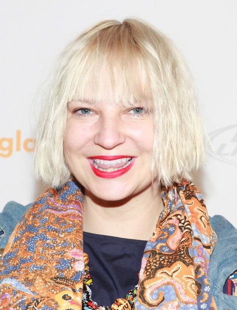 Why Does Sia Cover Her Face With a Wig? Here’s the Answer | Allure Sia Wig, Sia Singer, Sia And Maddie, Sia Kate Isobelle Furler, Music Rules, The Fame Monster, Neo Soul, Beautiful Prom Dresses, Famous Singers