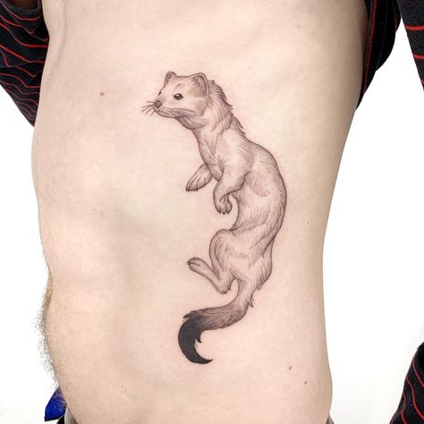 ⚪️Ermine⚫️ . Handsome fellow for @stevieponders to rep his family’s crest animal ! Thank you so much Steve!! . I 🖤 doing animals :) . . . .… Ermine Tattoo, Rib Tattoos For Guys, Spooky Tattoos, His Dark Materials, Line Work Tattoo, Work With Animals, Rib Tattoo, Fine Line Tattoos, Blackwork Tattoo