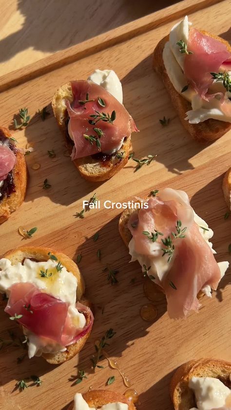 Fall Crostinis -1 Baguette cut into slices -Olive Oil -Prosciutto -Burrata -Fig Jam -Thyme -Honey 1. Brush bread with olive oil and bake in oven at 350 for 15 minutes, flipping halfway through 2. Top with fig jam, burrata, prosciutto, thyme, and drizzle with honey 3. enjoy! #thanksgivingappetizers #appetizer #thanskgiving #fallcrostini #crostini Bread With Olive Oil, Fig Jam, Thanksgiving Appetizers, Baguette Cut, Thyme, 15 Minutes, Fig, Olive Oil, Jam