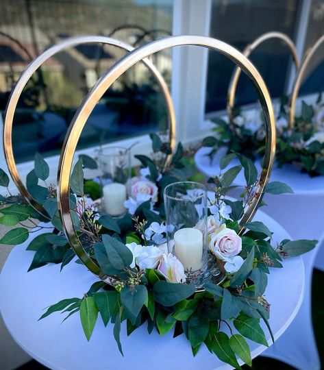 Gold Hoop Table Centerpiece, Gold Centerpieces With Greenery, Hoop Wedding Table Decor, Emerald Green 15 Centerpieces, Gold Circle Centerpiece Wedding, Gold Table Centerpieces Wedding, Ring Centerpieces Wedding, Engagement Party Green And Gold, Green Gold And White Centerpieces