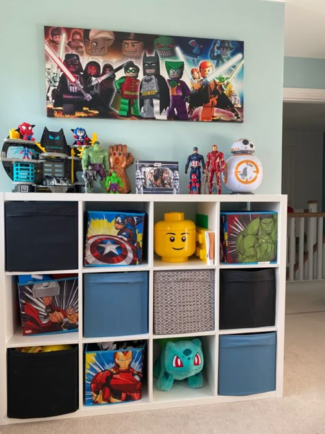 Subtle avengers and superhero bedroom decor, boys bedroom ideas, kids bedroom storage, superhero bedroom storage, toy storage ideas, toy storage cube Ikea Bed For Boys Room, Marvel Toy Storage, Lego Superhero Room, Avenger Room Decor Bedroom Ideas, Toddler Boy Room Toy Storage, Boys Bedroom Ideas Age 4, Subtle Superhero Bedroom, Kids Toy Storage Ideas Bedroom, Avengers Room Ideas Boy Bedrooms