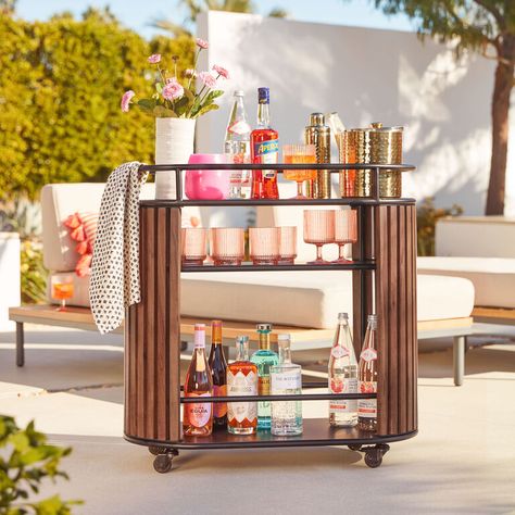 Outdoor entertaining design inspo #summer #entertaining #outdoorentertaining #patio #barcart #summerfun #designinspo #designinspiration Mid Century Office Ideas, Bar Cart Outdoor, Mid Century Office, Rugs Outdoor, Wood And Steel, Outdoor Dining Furniture, Outdoor Bar, World Market, Outdoor Entertaining