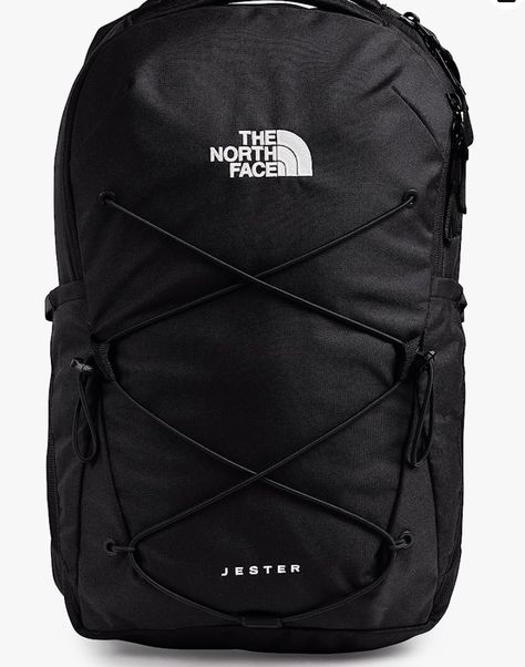 The ultimate pack for a day out features a 15" laptop sleeve, women-specific shoulder straps and a feature-rich layout. A large main compartment hold books and binders while a front elastic bungee system provides external storage Northface Backpacks, Black North Face Backpack, North Face Backpacks, The North Face Jester, Jester Backpack, North Face Jester, Occasion Shoes, Shoe Boutique, Shoe Gifts