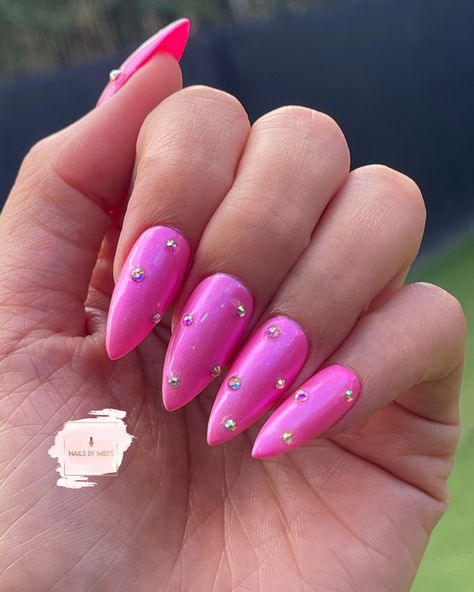 Barbie Pink Nails With Rhinestones, Pink Chrome Glitter Nails, Hot Pink Nails With Diamonds Rhinestones, Hot Pink Nails With Jewels, Hot Pink Rhinestone Acrylic Nails, Hot Pink Nails With Pearls, Hot Pink Jeweled Nails, Pink Prom Nails Acrylic Almond, Pink Chrome Nails With Pearls