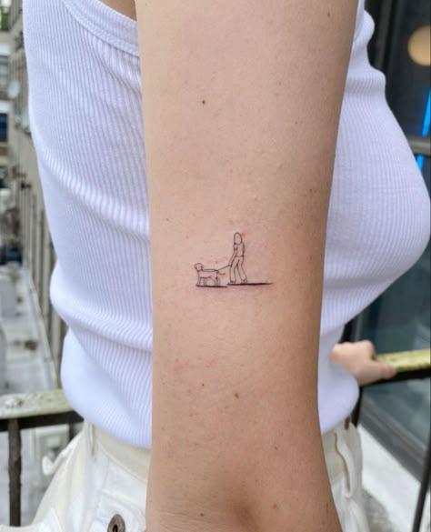 Djo Inspired Tattoos, Tiny Person Tattoo, Walking Dog Tattoo, Tiny Dog Tattoo Minimalist, Tattoo Dog Minimalist, Tattoo For Dog That Passed, Tiny Dog Tattoo, Minimalist Dog Tattoo, Dog Tattoo Ideas Minimalist