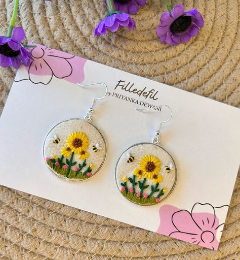 Hand Embroidered Custom Earrings 🌻🪻🌼💝 DM to Shop📩 Shipping all over India 📦 (Earrings, unique handmade, handmade jewellery, embroidered, embroidered jewellery, handmade gifts,sunflower love, sunflower embroidery, love sunflower, sunflower lovers, earrings, unique jewellery) Embroidery Earrings Handmade Jewelry, Diy Embroidery Earrings, Hand Embroidery Jewelry, Embroidery Jewellery, Embroidered Jewellery, Bengali Poems, Sunflower Love, Sunflower Embroidery, Hand Embroidered Jewelry