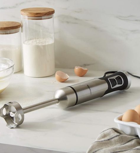 Hand-held immersion blender for mixing soups, sauces, smoothies, and more Must Have Kitchen Appliances, Cabinet For Storage, Kitchen Tools Design, Immersion Blender, Best Blenders, Smoothie Blender, Pots And Pans Sets, Vegetable Chopper, Blender Recipes