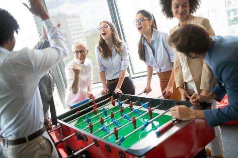 Apart from working hours, it is also necessary that you plan team outings for your employees or can organise some fun activities like Zumba. These stress management activities will help boost your employees’ confidence and will also be a reason for interaction with others. We recommend that these team-building exercises are a must when it comes to keeping your employees stress free. Table Soccer, Table Football, Team Building Exercises, Fun Organization, Soccer Table, Break Time, Work Hard Play Hard, Company Culture, Indoor Games