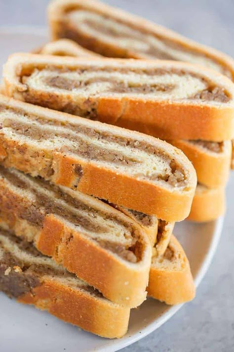 A plate with slices of nut roll. Old Fashioned Nut Roll Recipe, Hungarian Nut Roll, Polish Bread, Nut Roll Recipe, Nut Roll, Brown Eyed Baker, Slovak Recipes, Polish Foods, Nut Rolls