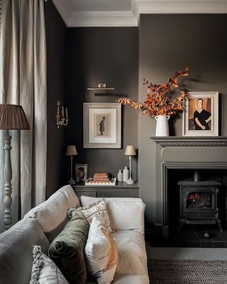 Wall Paneling Around Fireplace, Moody Fireplace Wall, Dark Walls White Trim, Moody Tv Room, Moody Fireplace, Moody Lounge, Dark Walls Living Room, Living Room Dark, Living Room Upgrades