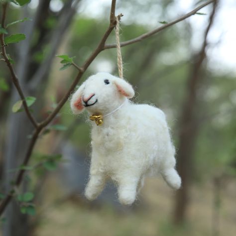 PRICES MAY VARY. This Sheep is Made of 100% genuine felt & measures 5" by 4.5" by 1.5" inches (LWH) The Sheep is crafted with genuine felt and wool. This unique version will be the highlight of your decor. These ornaments will make a lovely addition to special occasions or social gatherings with party decorations. This garland is a perfect gift for Christmas, Weddings, New Year, birthday, Baby Showers or any celebration! Especially for nursery or kid's bedroom, this hanging will add a warm and s Needle Felted Lamb, Felt Animal Christmas Ornaments, Needle Felted Goose, Felting Ornaments, Water Felting, Felt Animal Ornaments, Easy Primitive Crafts, Sheep Ornaments, Felt Sheep