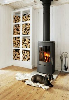 Wall Behind Wood Stove | Wood "wall unit" - Great for when we install the wood burning stove ... Design Interior Modern, Scandinavian Room, Firewood Storage, 아파트 인테리어, Stove Fireplace, Wood Burner, Cabin Life, Wood Storage, Wood Burning Stove