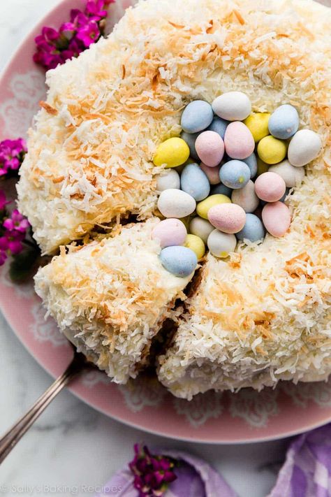 Make a beautiful coconut Easter cake, topped with silky lemon cream cheese frosting, coconut, and chocolate egg candies to resemble a nest. Easy decorated spring and Easter dessert on sallysbakingaddiction.com Easter Bakes, Easter Nest Cake, Easter Bundt Cake, Easter Desserts Cake, Cake Flour Substitute, Hummingbird Cake Recipes, Easter Cake Recipes, Pecan Tarts, Tarts Recipe