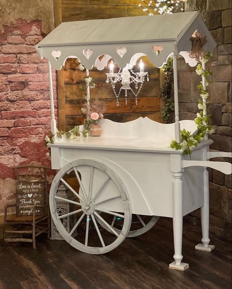 Beautiful addition to any Wedding or Party! Complete w/ Crystal Chandelier and flowers😍 Rustic Sweet Cart Wedding, Carriage For Wedding, Desert Cart, Carriage Candy Table, Wooden Flower Cart, Build Candy Cart, Wedding Candy Cart, Wedding Sweet Cart, Flower Carts